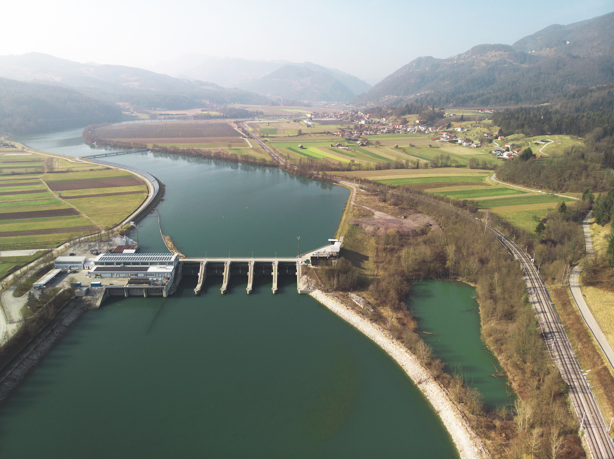 Hydroelectric dam storing gravitational potential energy in its reservoir