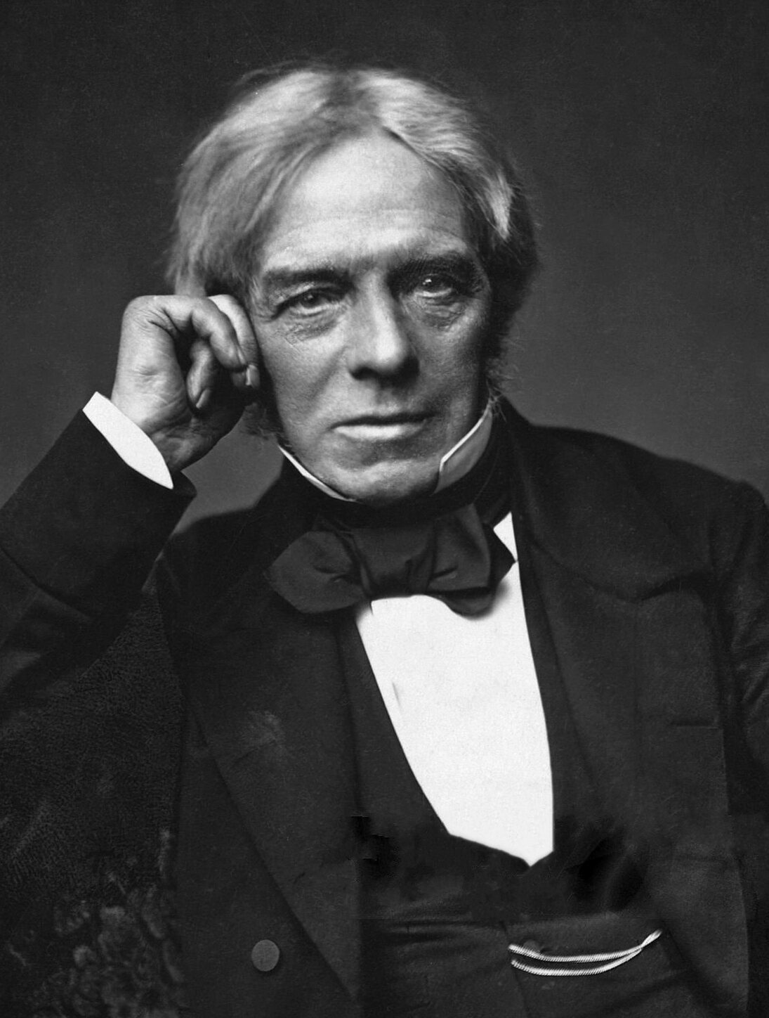 Michael Faraday, who introduced the electric field concept