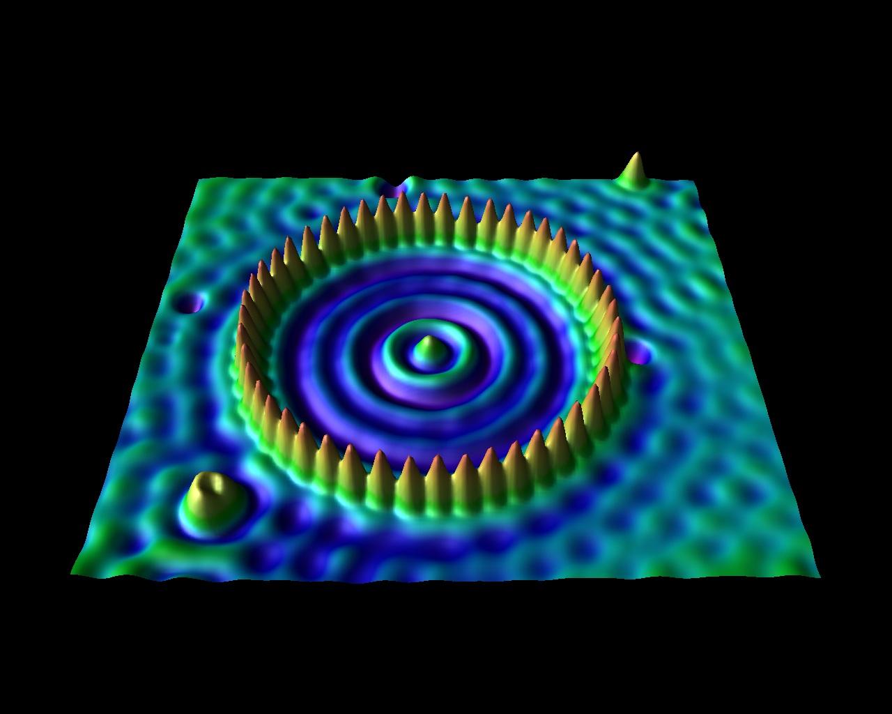 Scanning tunnelling microscope image in which individual atoms on a surface appear as a regular pattern of bumps, a direct view of atomic structure