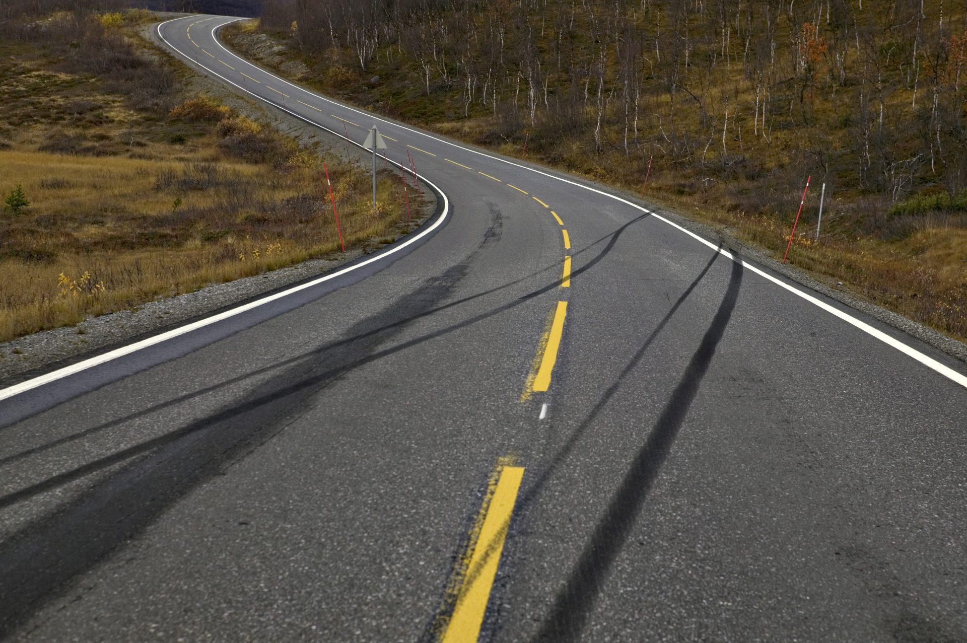 Skid marks on a road, the length that the work energy theorem turns back into a speed